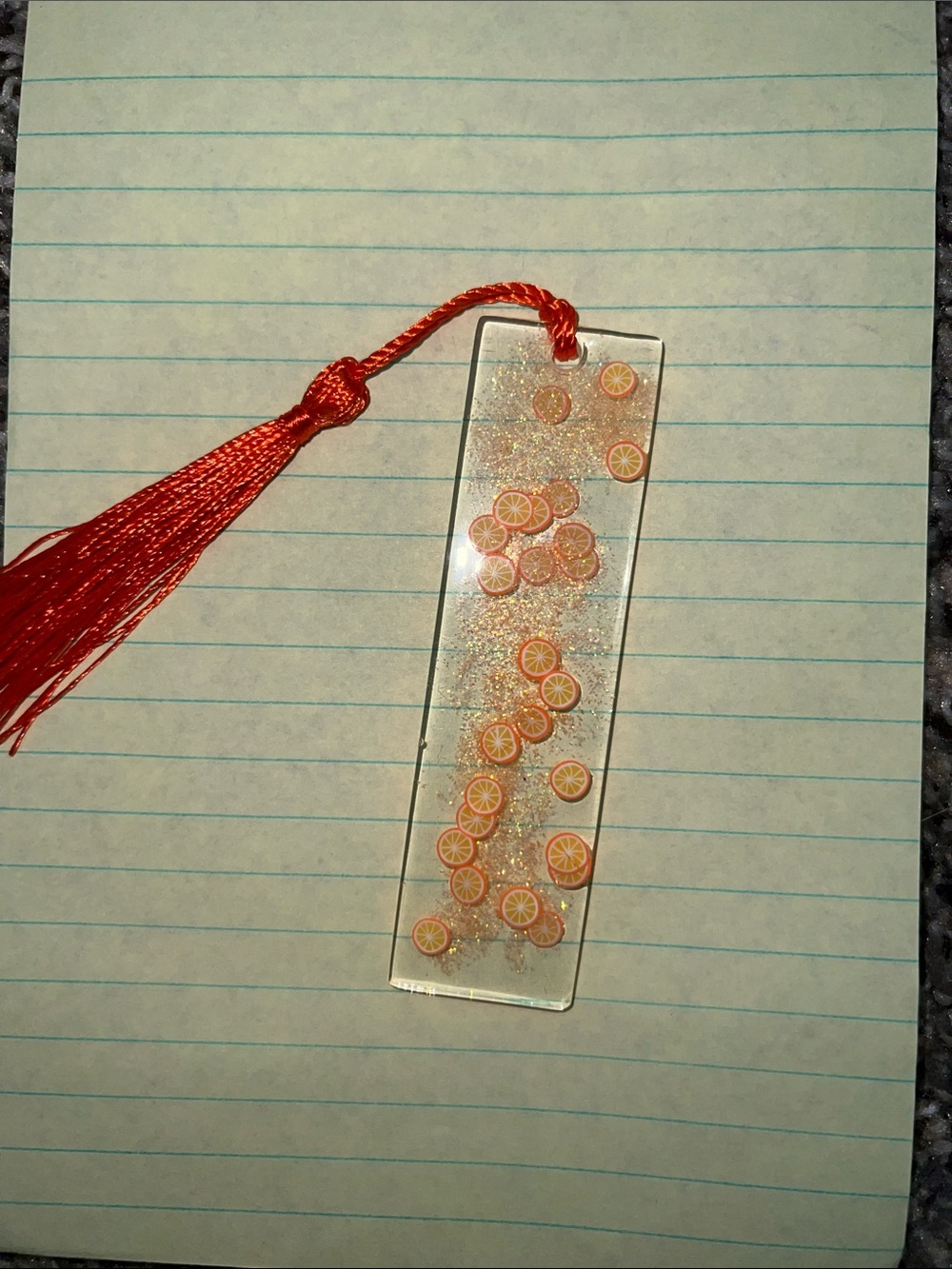 Clear Resin Bookmark with Orange Slice Accents and Red Tassel